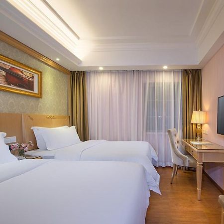 เวียนนา 3 เบสต์ คอนเวนชั่น เอ็กซิบิชั่น เซ็นเตอร์ ฉือกัง Hotel กวางโจว ภายนอก รูปภาพ