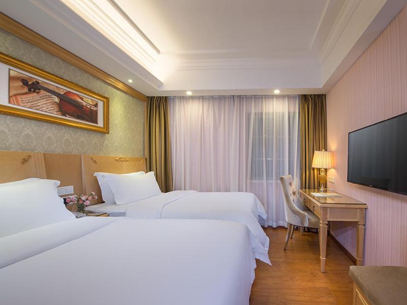 เวียนนา 3 เบสต์ คอนเวนชั่น เอ็กซิบิชั่น เซ็นเตอร์ ฉือกัง Hotel กวางโจว ภายนอก รูปภาพ